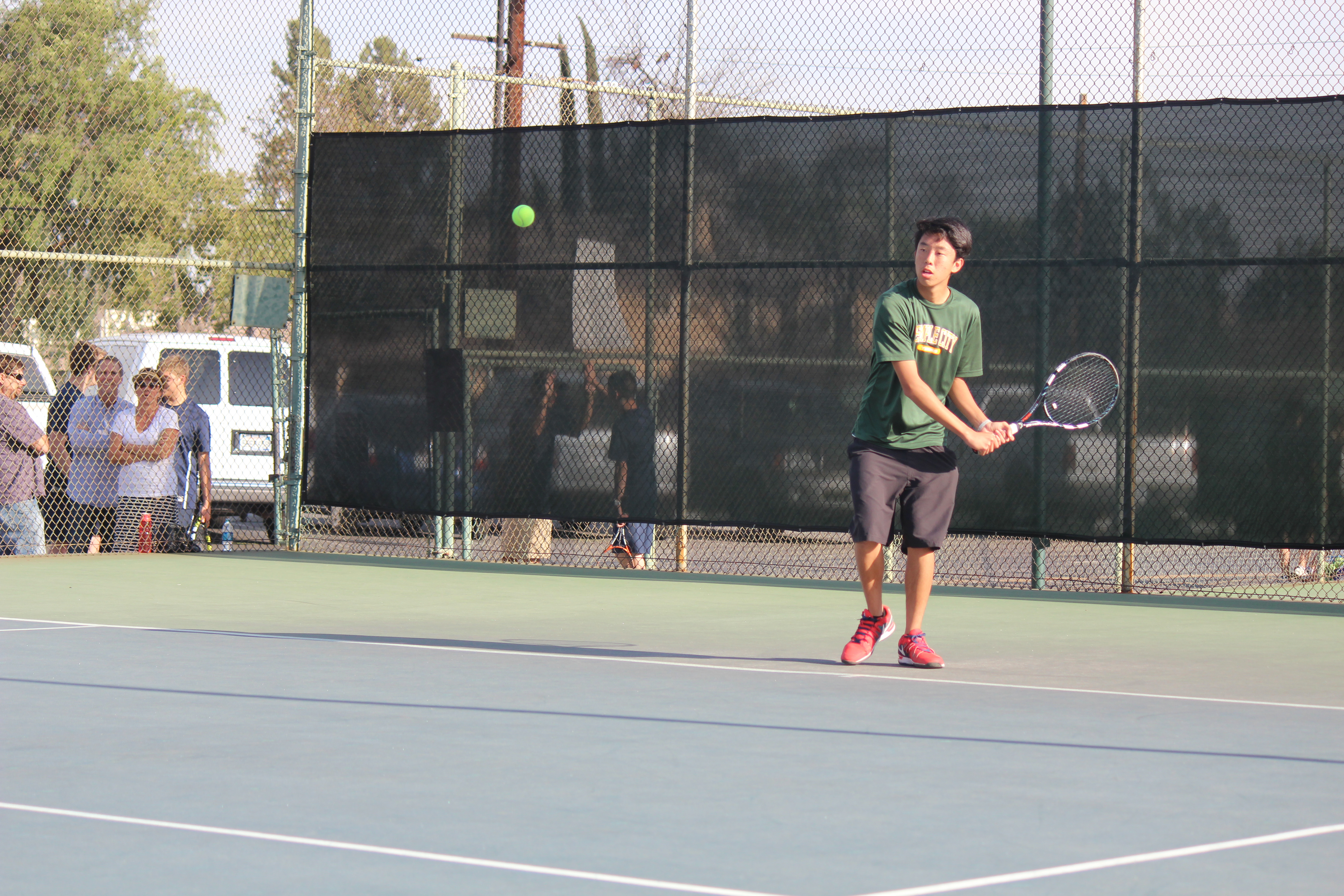 Boys Tennis swings and strikes for success