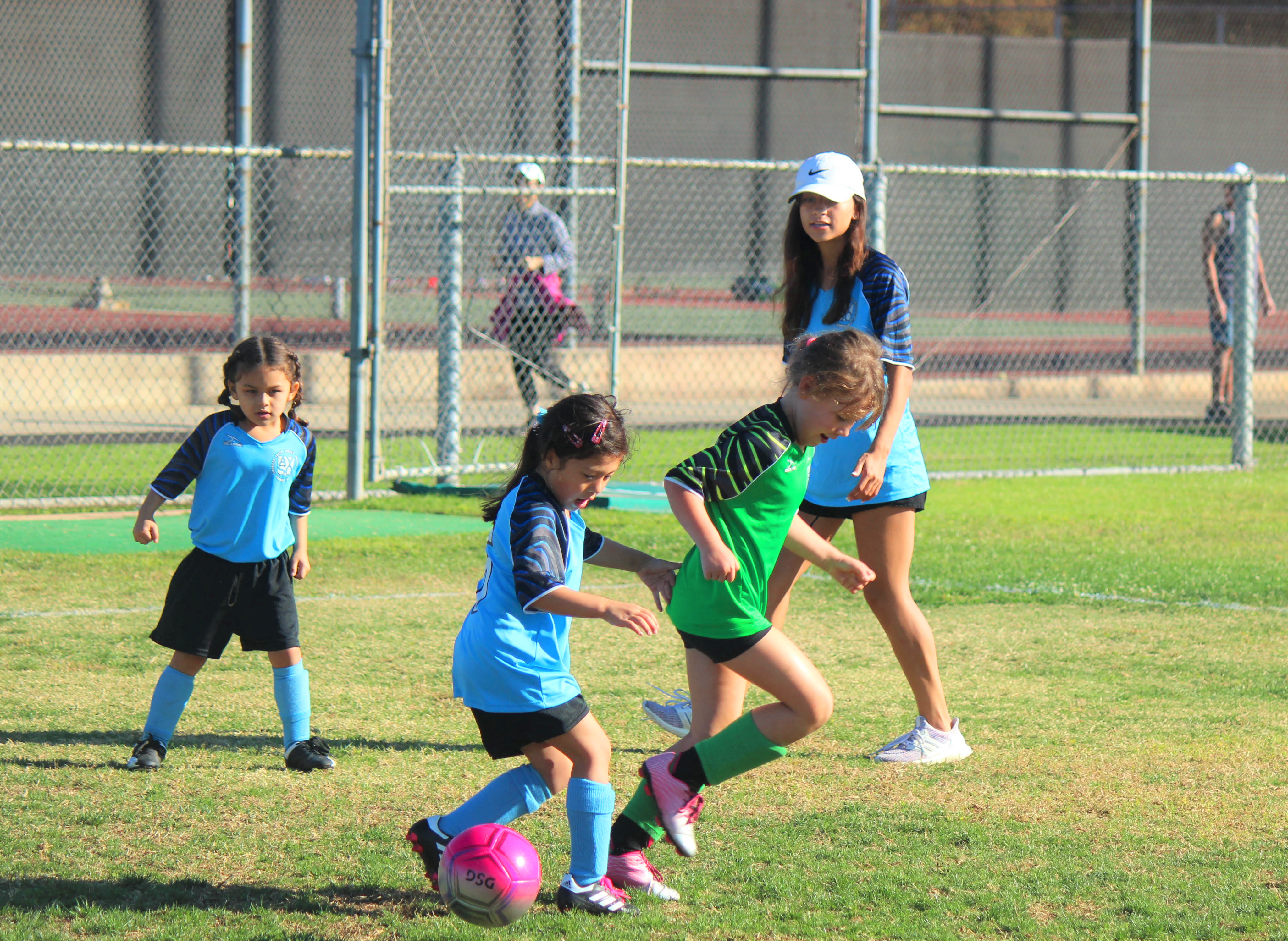 AYSO coaches community kids